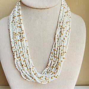 White glass seed beads multi strand necklace with matte goldtone accents